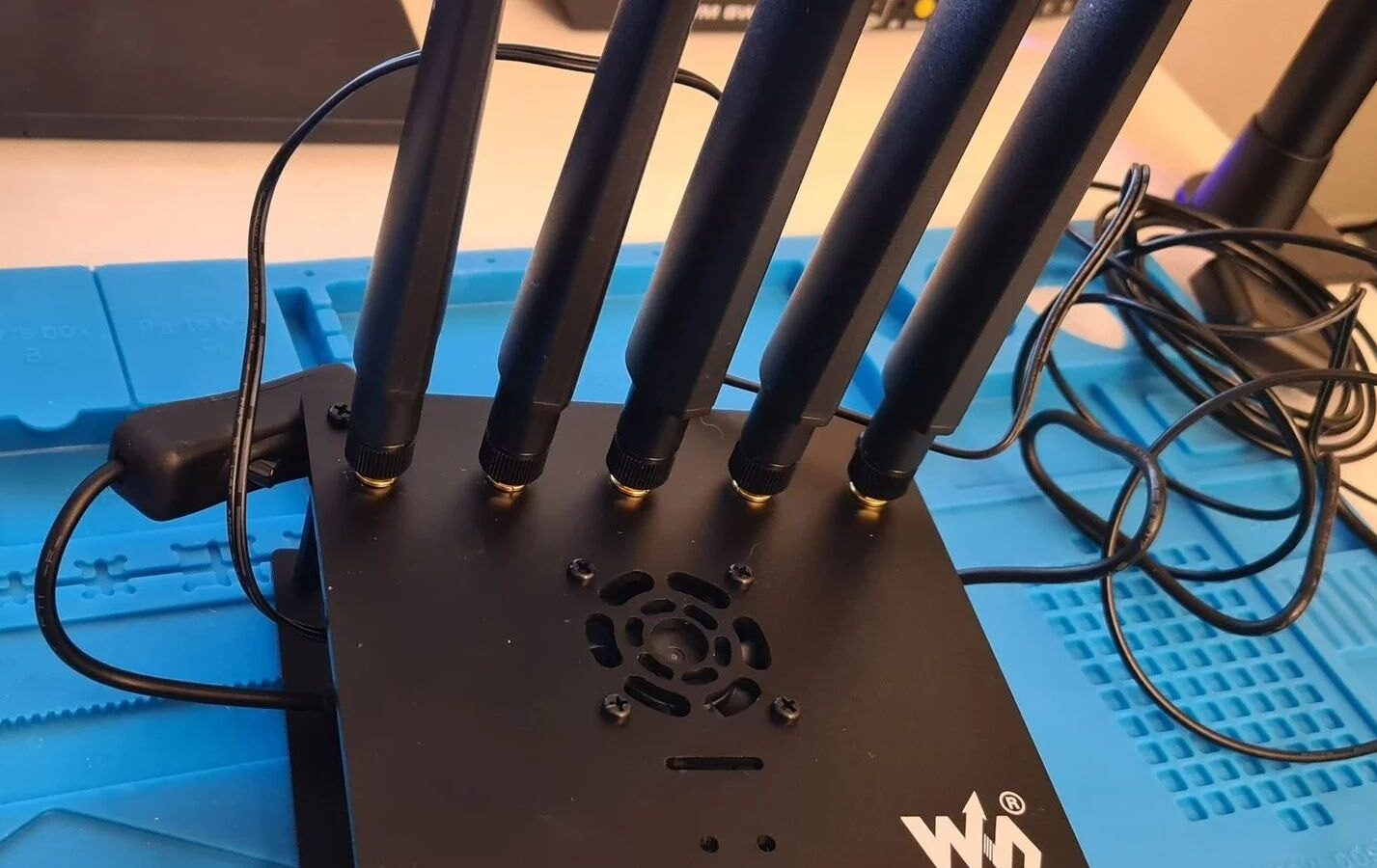 Enclosure with five cellular antennas on an ESD mat
