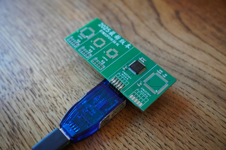 STM32F205RBT6 soldered onto the adapter board and plugged into the dongle